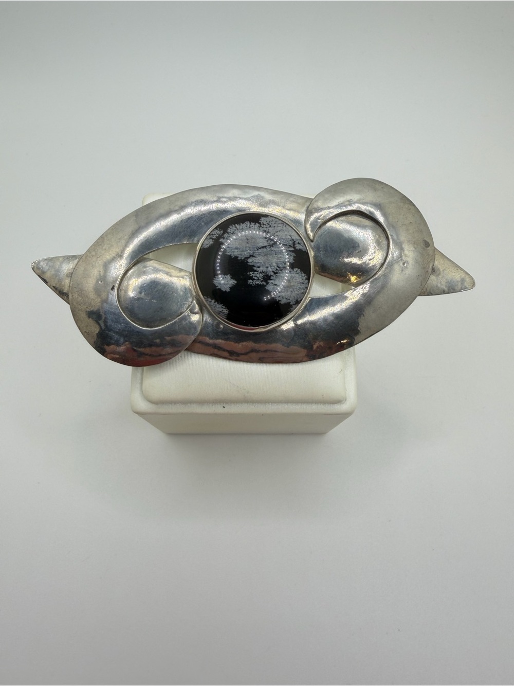 4" wide Artisan marked, silver tone brooch with 24mm snowflake obsidian stone!